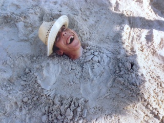 A picture of Mike Loepfe enjoying life in the sand